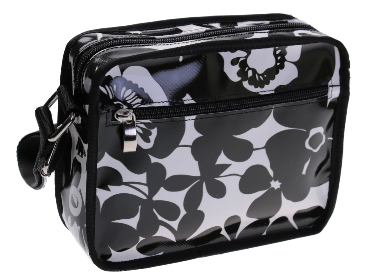 SMALL CROSSBODY BAG BLACK AND WHITE WITH FLORAL FANTASY. MODEL FRIK MADE OF LORRY TARPAULIN. - Limited Edition Paul Meccanico